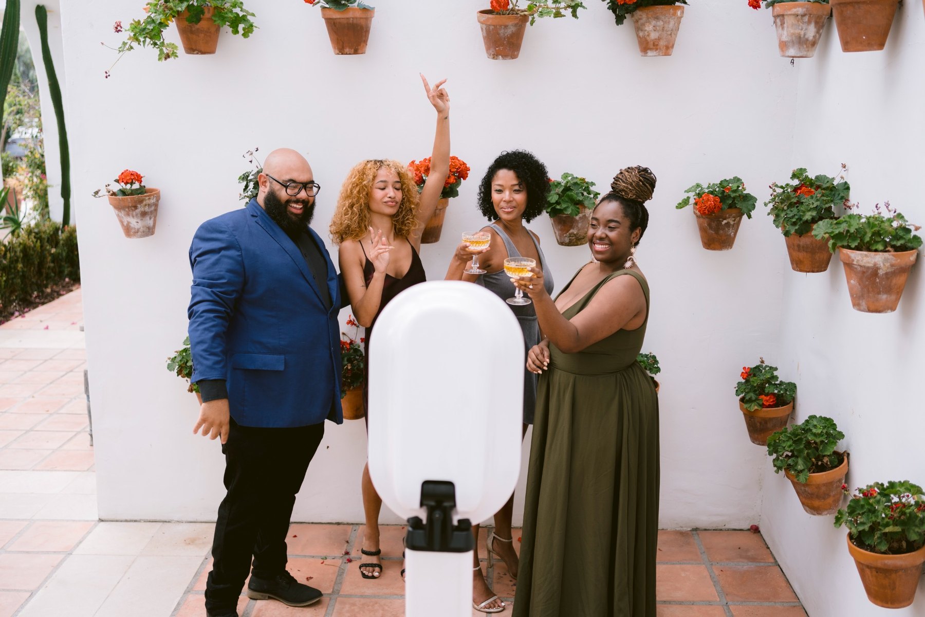 Guests posing together at a garden event